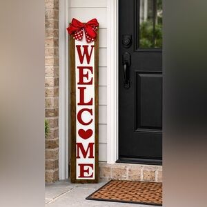 Red and White Welcome Sign